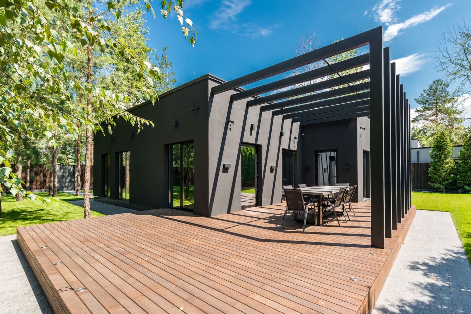 Residential wood deck with outdoor dining furniture